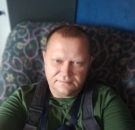 Николай