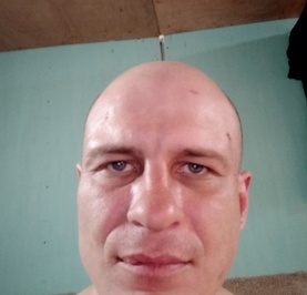 Николай